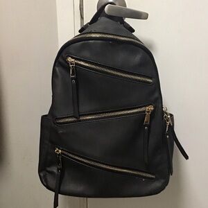 Stylish Black Backpack with Gold Accents